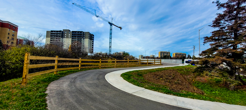 Northbound view of the new pedestrian bridge north of Leighland Avenue.