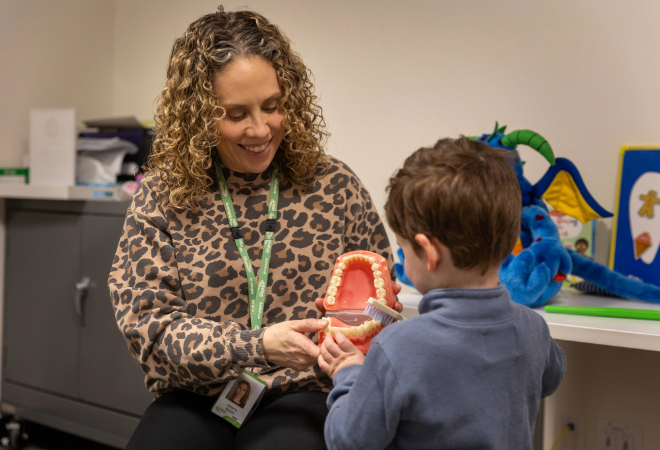 Teaching a child about teeth brushing