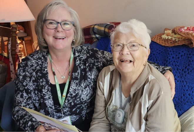 A care worker with an older adult.
