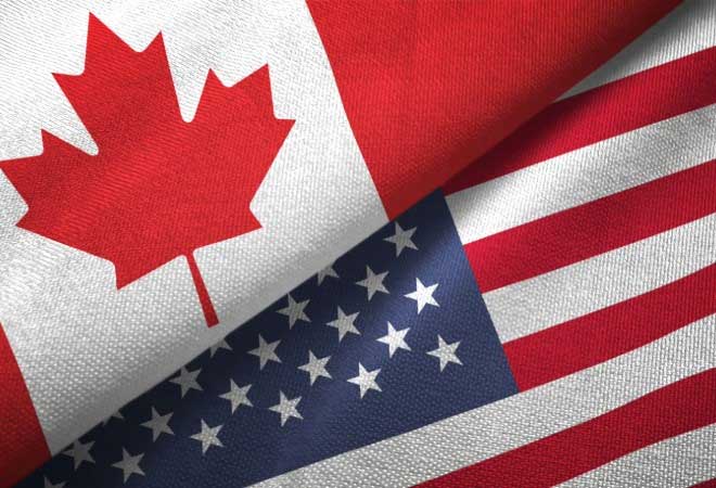 Canadian and American flags