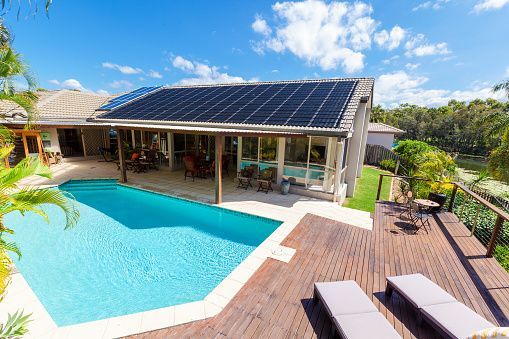 private pool in the backyard of a house
