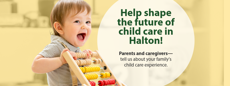 Child playing next to bubble with text 