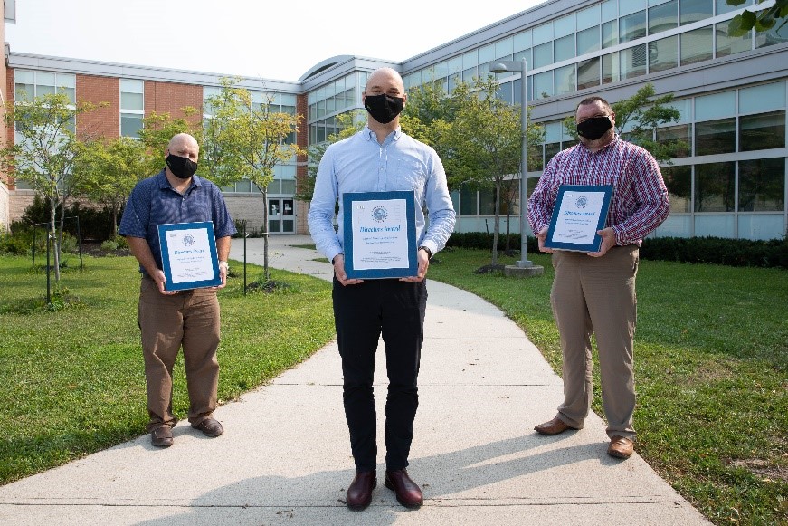 Photo of the Safe Water Team and their award