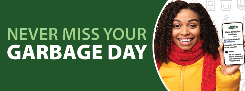 Woman holding phone with waste reminder, text overlay reads, "Never miss your garbage day."
