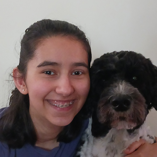 Photo of Elena Vala and a dog
