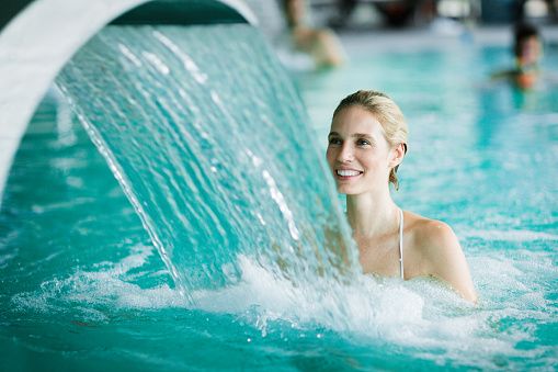 woman in public pool at spa