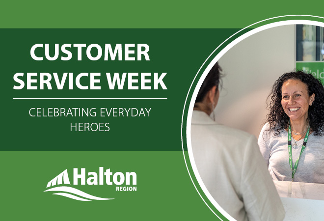 A smiling customer service representative assisting a resident at Halton Regional Centre.