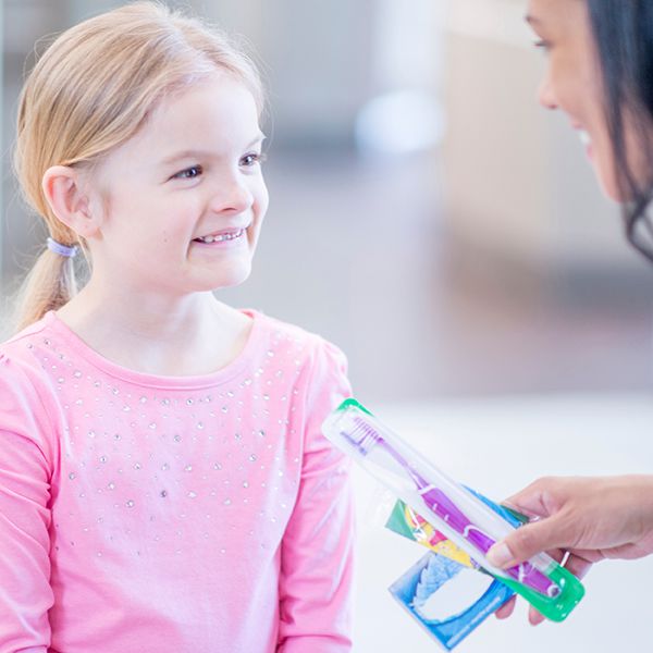 HE-kid-learning-about-oral-care.jpg