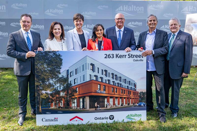 A group of elected officials celebrating the groundbreaking ceremony for the Kerr Street project