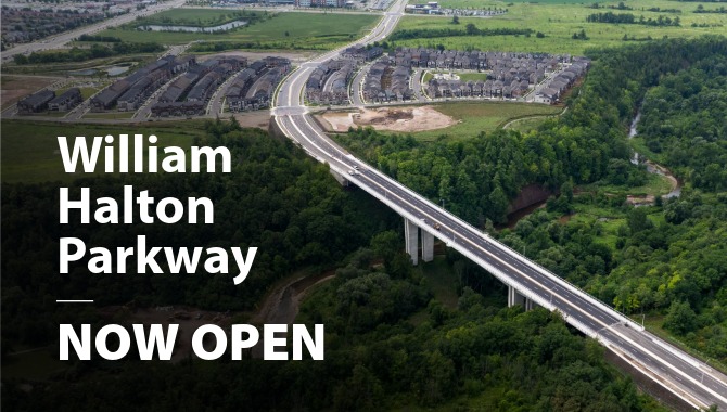 Aerial view of roadway over a wooded area