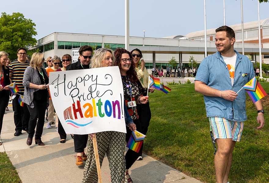 Regional staff join a parade around Halton Regional Centre in celebration of Pride Month.