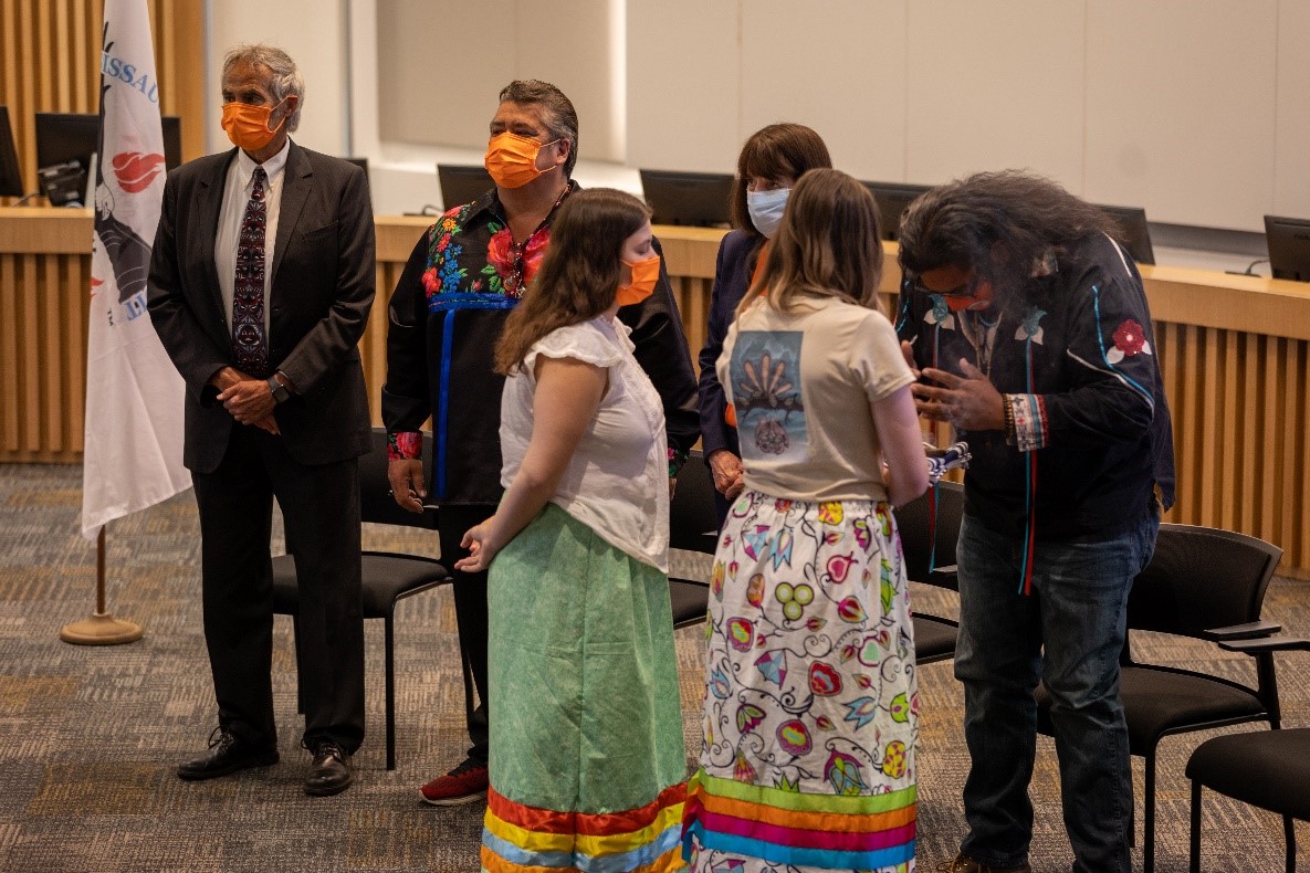 To begin the ceremony, staff led a smudging ceremony for attendees. From left to right: Halton Regional Chair Gary Carr, Ogimaa R. Stacey Laforme, Danielle Nicolardi, Halton’s Indigenous Relations Intern, Paige Saunders, Halton’s Indigenous Relations Summer Student, Jane MacCaskill, Chief Administrative Officer, and Councillor Kelly Laforme from the Mississaugas of the Credit First Nation.