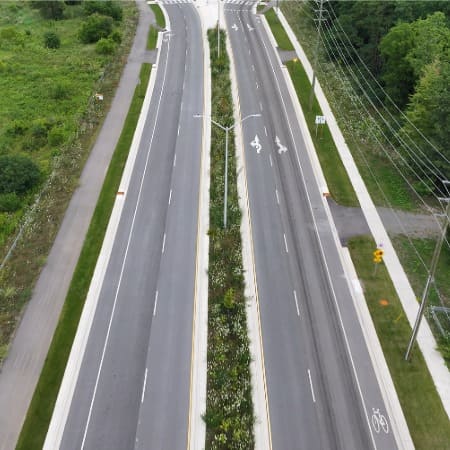 A four-lane roadway separated by a median.